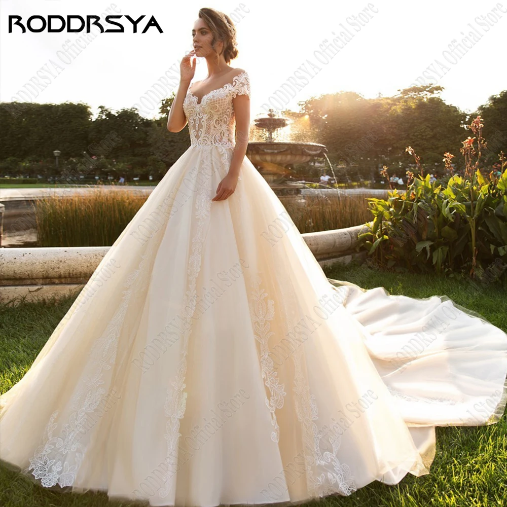 

RODDRSYA Exquisite Scoop Wedding Dresses Short Sleeves Sexy Backless Bride Gowns Champagne Applique 2023 Vestidos De Novia