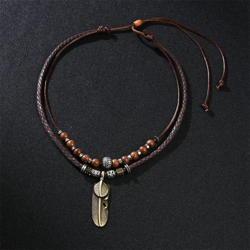 Collier Tribal rétro superposé, tressé, pendentif en plumes, corde