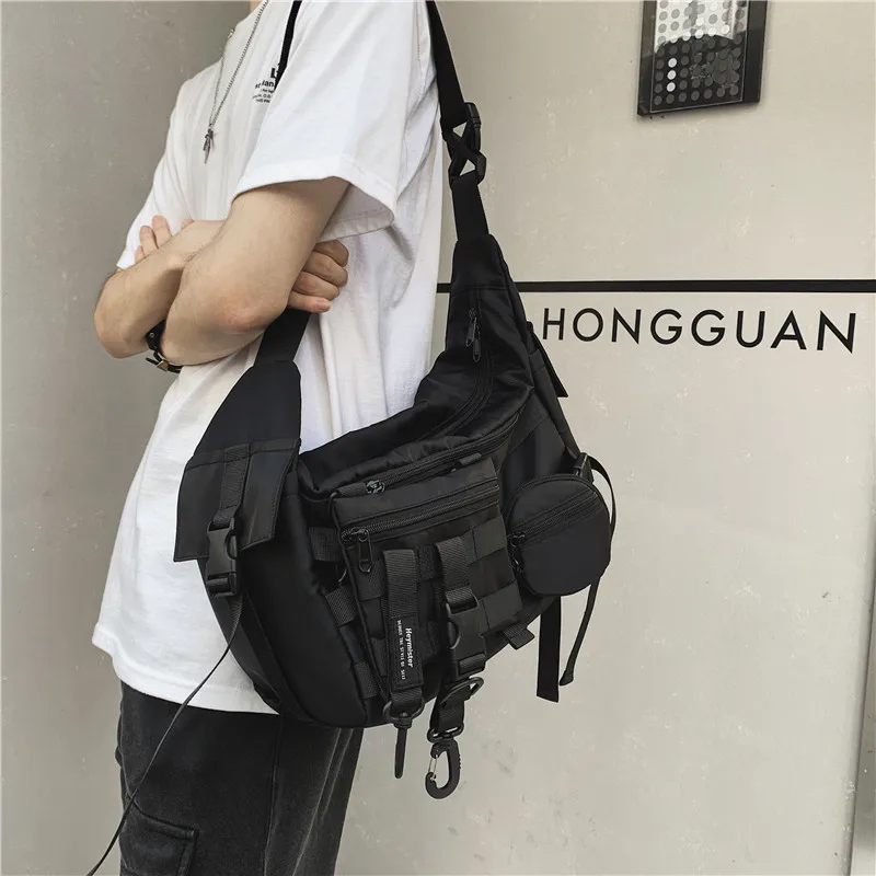 

Messenger bag men's tide brand large capacity shoulder bag diagonal bag ins Japanese tooling bag Unisex student shoulder bag.