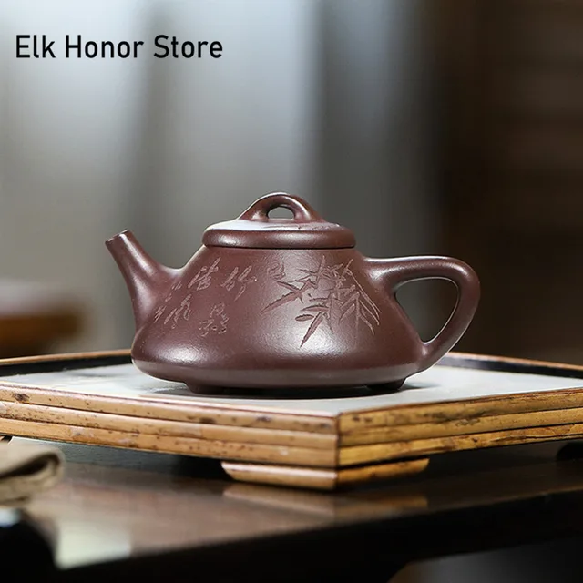 Yixing tea pot: A traditional Chinese teapot known for its heat retention and ability to enhance the flavor of tea.