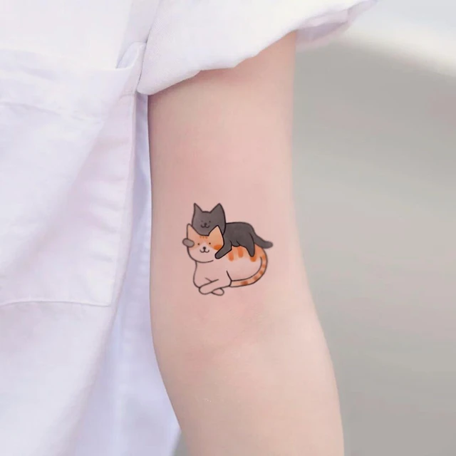 Discover more than 144 orange cat tattoo best vova.edu.vn