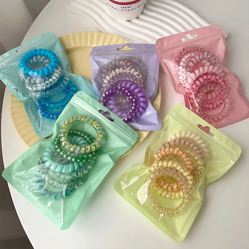 AWAYTR 6pcs Cute and Colorful Spiral Hair Ties Resin Jelly Coil Hair Rings for Women and Girls Ponytail Holders Hair Accessories