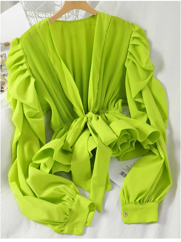 Camiseta de manga larga abombada para mujer, camisa con lazo de Color liso, con cintura cerrada y correa de temperamento, novedad de primavera y verano