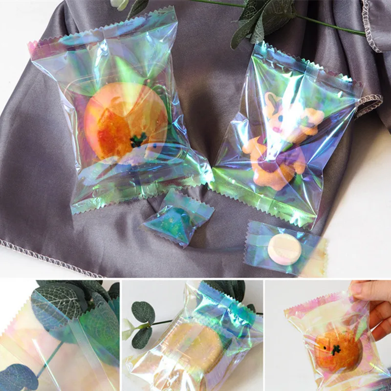 100Pcs 레인보우 투명 레이저 플랫 포켓 캔디 비스킷 베이킹 기계 봉인 된 가방 파티 선물 포장