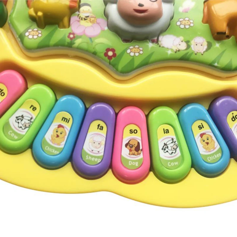 Brinquedo infantil pianinho musical fazendinha musicas sons de animais luz  e alca