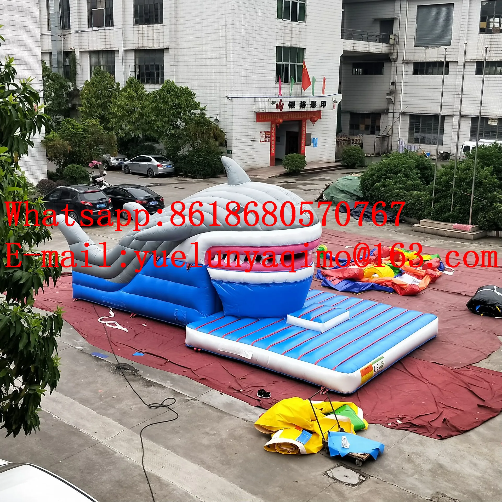 

Factory direct selling large outdoor shark inflatable slide jumping bed castle combination YLY-028