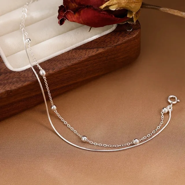 Silver lucky bracelets with a round ball shape