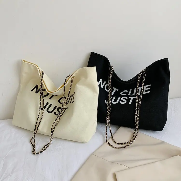 

43*36*10cmLarge-capacity chain underarm bucket bag large women's 2022 new trendy canvas retro messenger bag women's shoulder bag
