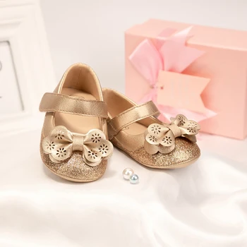 KIDSUN Scarpe da bambina Scarpe eleganti da principessa con fiocco in oro Scarpe da primo camminatore piatte con suola morbida in gomma antiscivolo Neonato Mary Janes 1