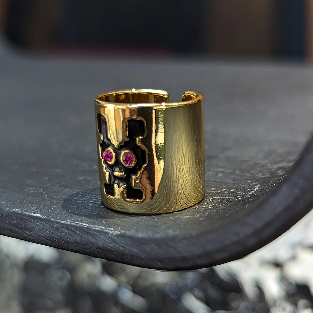 Gold ring with black heart deals