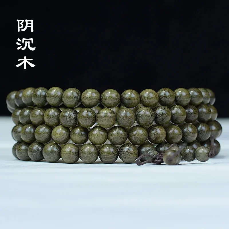

Sichuan jinshinan bracelet ebony 108 gloomy wooden Buddha beads hand string men and women lovers wooden literary ornaments