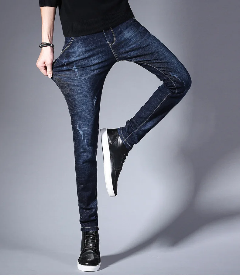 Jeans men's autumn and winter models 2022 new slim feet black tide brand winter men's trousers high-end slim jeans