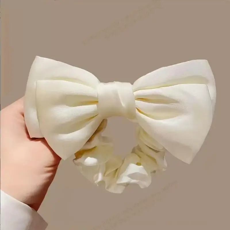 Elegant Satin French Bow Scrunchie - Luxury Textured Hair Accessory