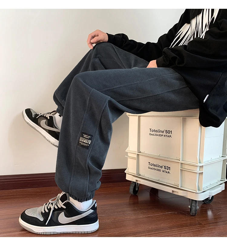 بنطلون رجالي جديد 2025 من قماش الكوردروي مبطن بالصوف فضفاض للعمل والرياضة في الخريف والشتاء مقاوم للتآكل ومضاد للأوساخ