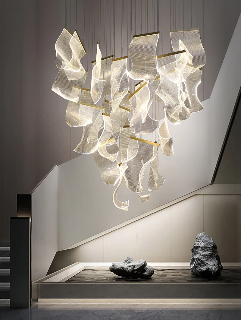 A glamorous, Postmodern chandelier graces the staircase of a home.