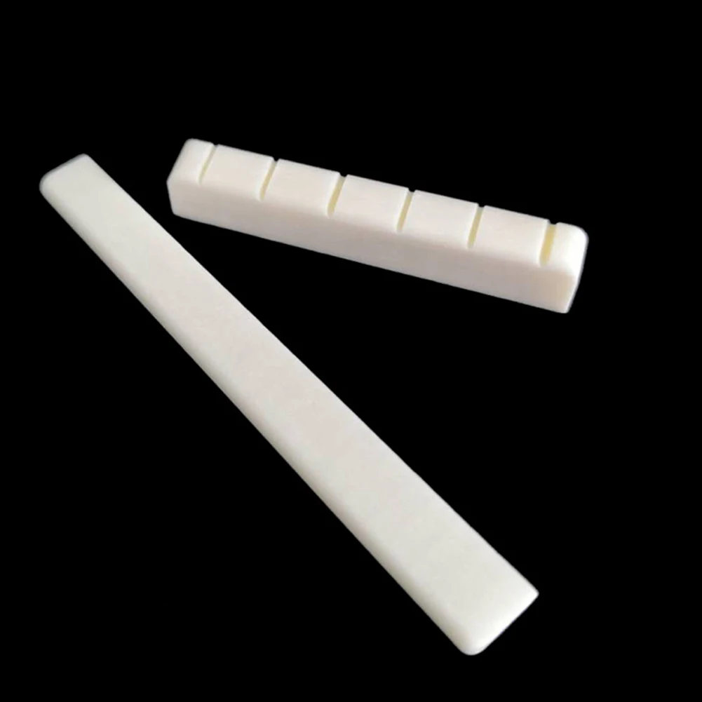 

High Quality Guitar Nut Real Bone 52mm 80mm Bone Bridge Classical Guitar Guitar Saddle Parts Replacement Saddle