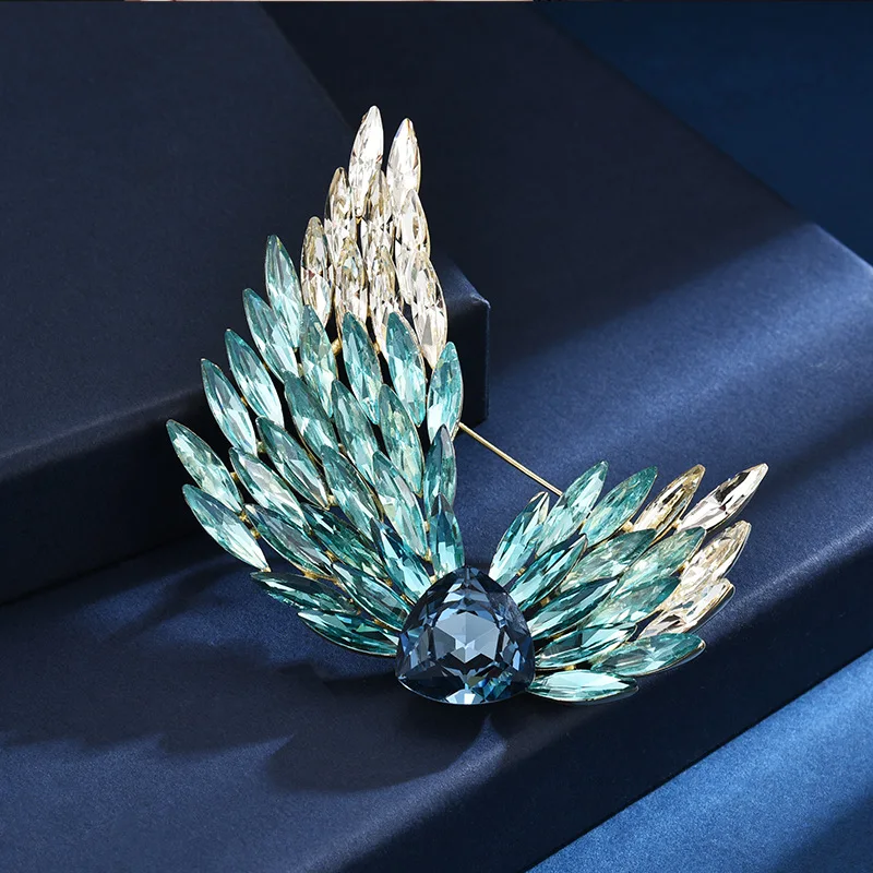 

New Fashion Luxury Austrian Crystal Ice Blue Wing Brooches for Women High-end Elegant Corsage Jacket Coat Accessories Pins