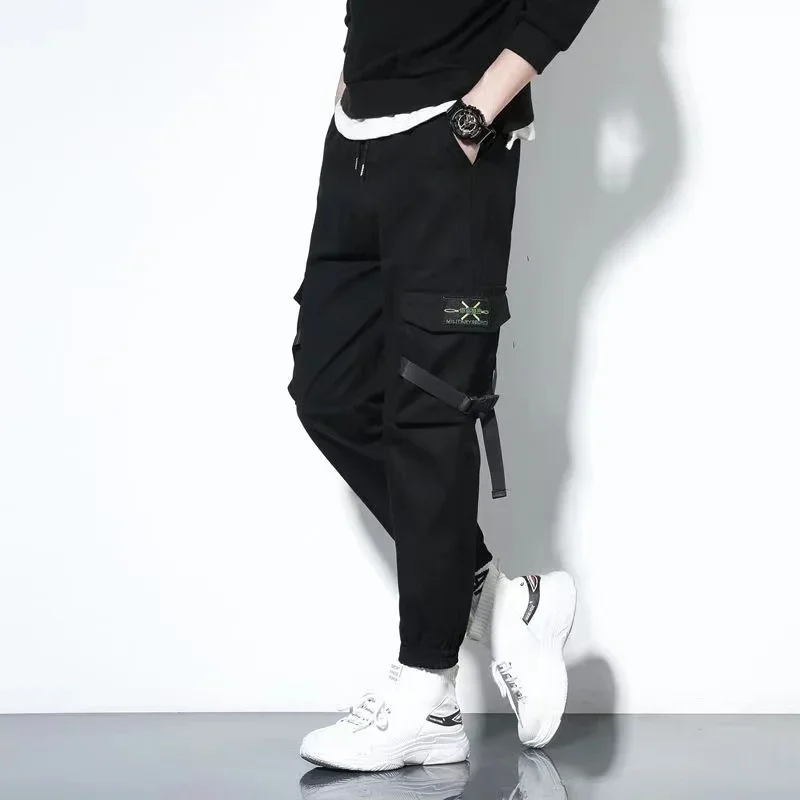 Overalls men's nine-cent casual pants fashion loose-fitting harem pants men's Korean version of the all-in-one leggings men's sl