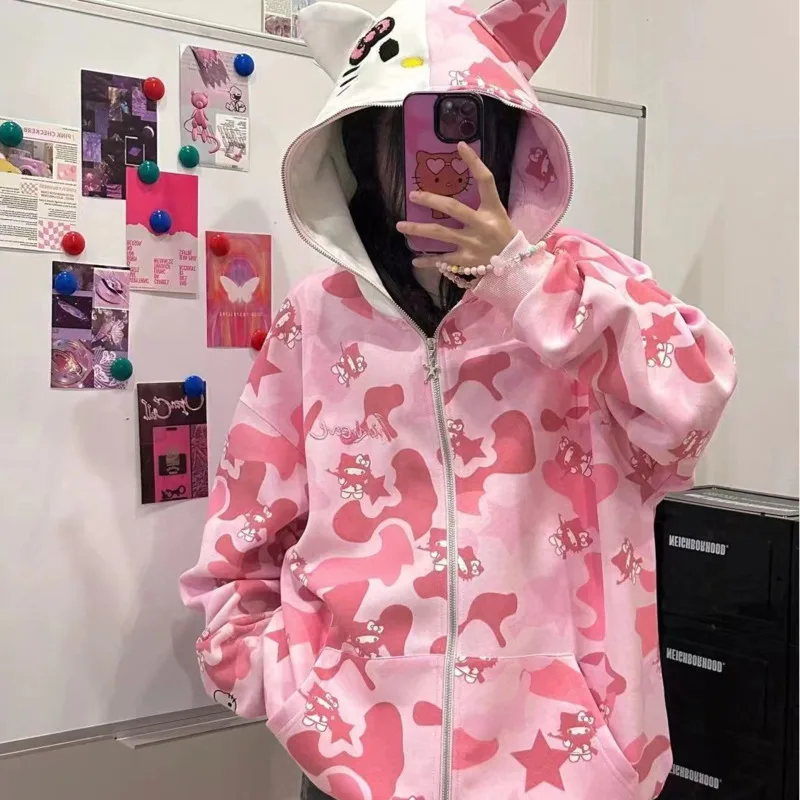 thumbnail image 1 of Sudadera con capucha bordada con estampado de estrella de camuflaje de Hello Kitty para mujer, abrigo informal holgado con cremallera, ropa de moda americana, 1 of 3