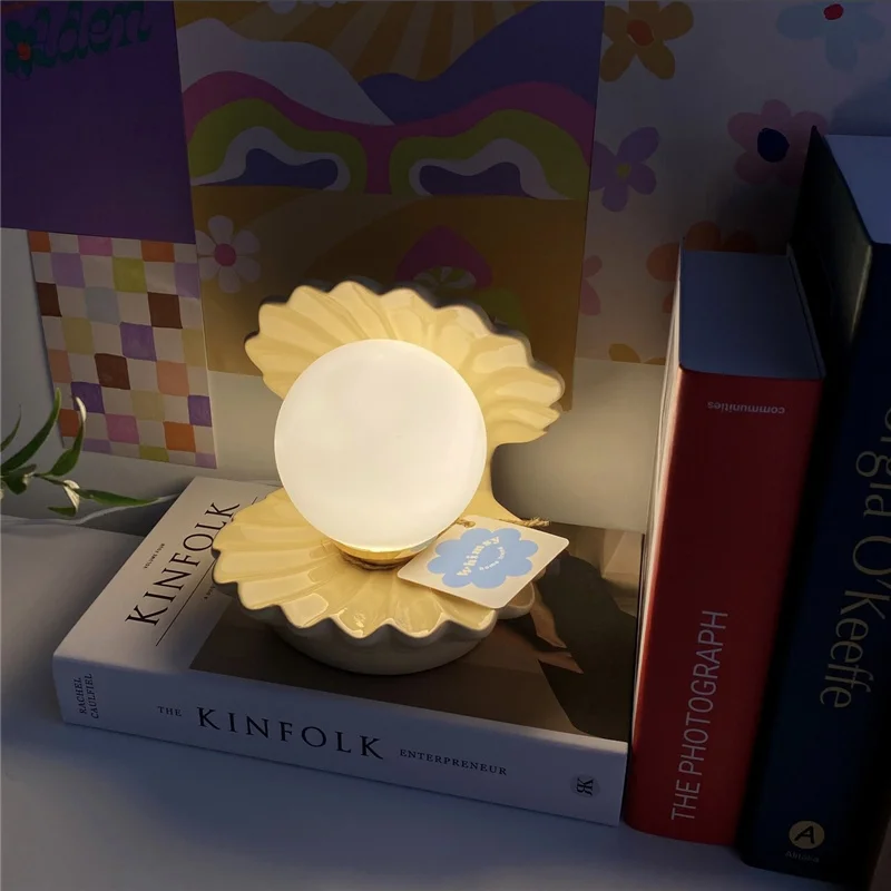 

Ins girl heart cream pearl lamp shell ceramic table lamp small night lamp bedroom bedside table lamp baby sleep eye protection p