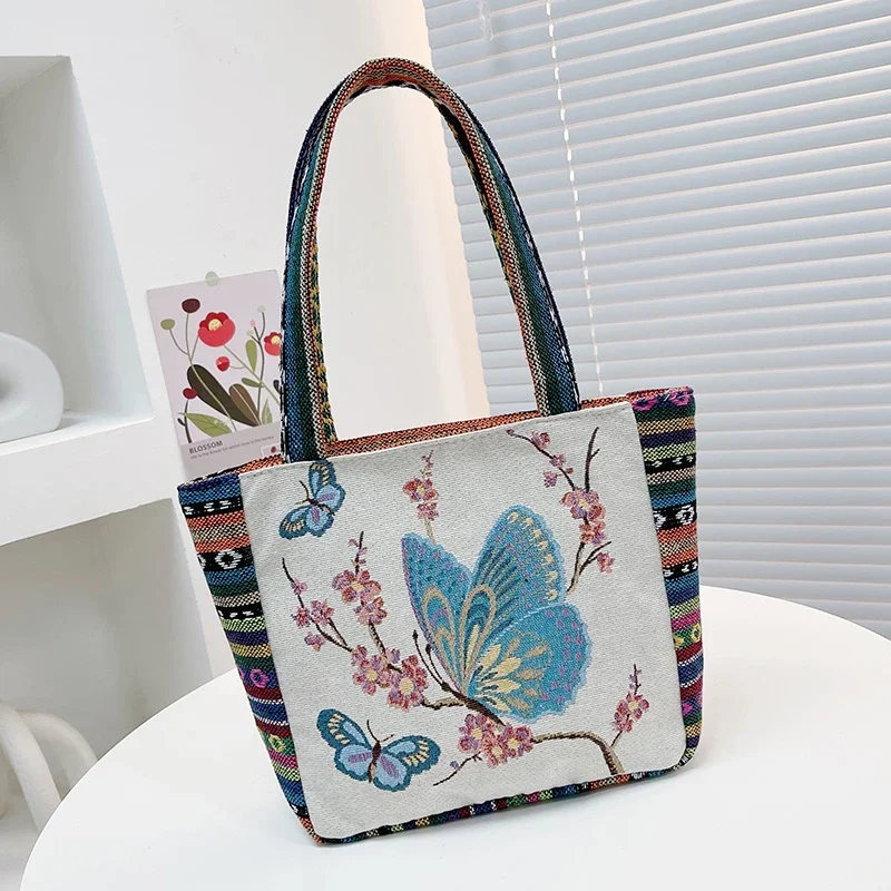 thumbnail image 1 of Bolsos de hombro de lona con patrón de bordado de moda, informales, de gran capacidad, para mujer, novedad de 2024, bolso cruzado versátil de gran oferta, 1 of 5