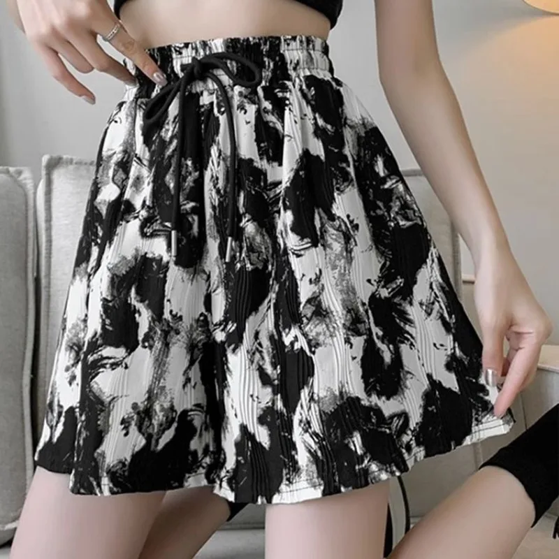 Ice Silk Wide Legged Women's 2024 Summer Spliced Elastic Waist Pocket Drawstring Printed Fashion Loose Slimming Sports Shorts