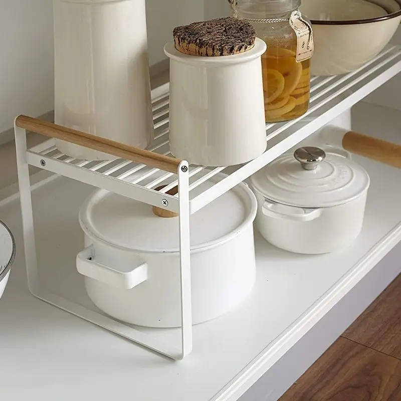 https://ae01.alicdn.com/kf/S64885030fae047d9a585ba40f1362411F/Cabinets-Counter-Shelf-2-Layers-Durable-Iron-Storage-Organizing-Rack-for-Kitchen-Bathroom-Under-Sink-Pantry.jpeg