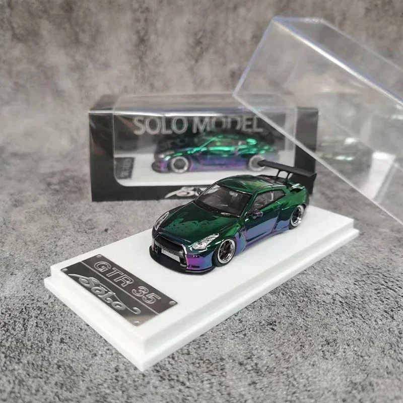 

Масштаб 1:64, модель автомобиля Rocket Bunny GTR35, литой под давлением волшебный зеленый цвет