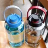 1.5/2L Large Capacity Plastic Water Bottle Outdoor drinkware And Sports Belt Handle Summer Water Bottle Camping 5