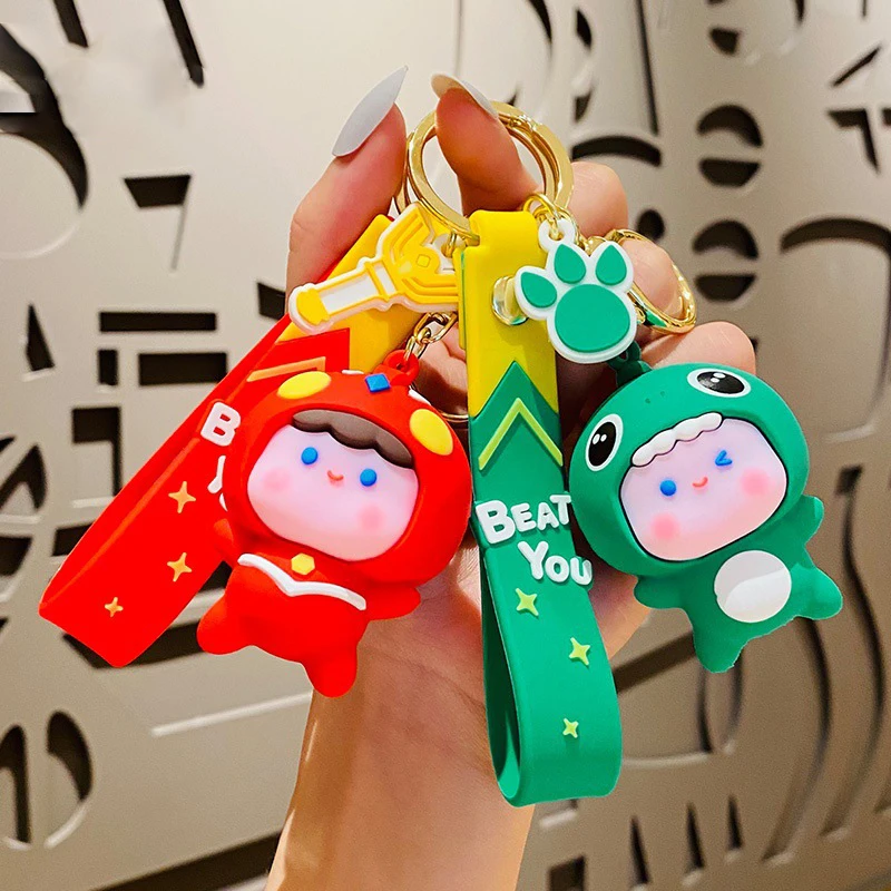 Simpatico Superman Con Dinosauro Little Monster Figure Portachiavi Cartoon Paw Print Head Cover Boy Portachiavi Coppia Regalo Hanging Gingillo