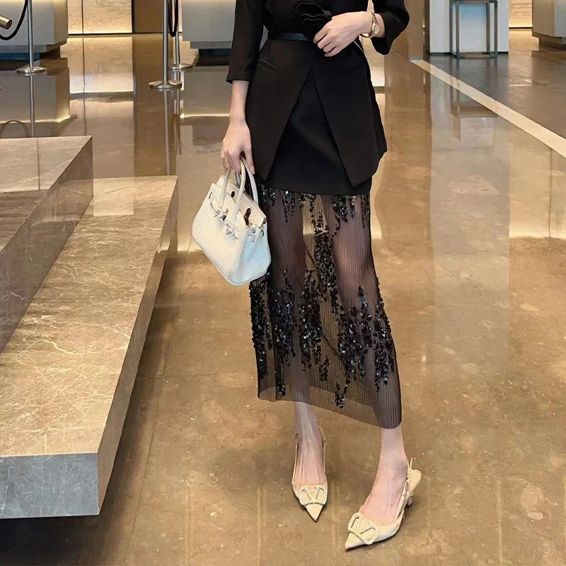 

Black patchwork mesh long skirt, spring/summer 2023, new design sense, niche French Hepburn style sequin half skirt for women