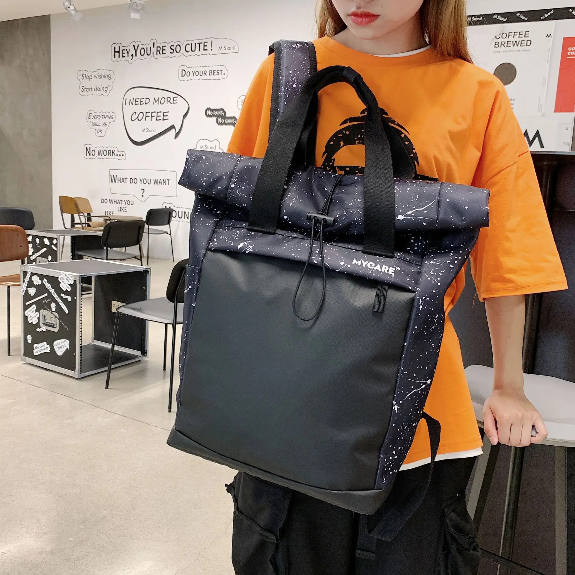 The new Korean version of the contrast color bucket backpack men's casual campus student backpack schoolbag backpack women