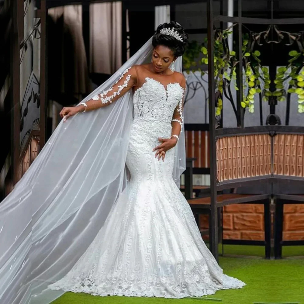 

Elegant White Arab Dubai African Bridal Dress Mermaid Long Sleeve lace applique beaded Wedding dress Nude tulle wedding dress