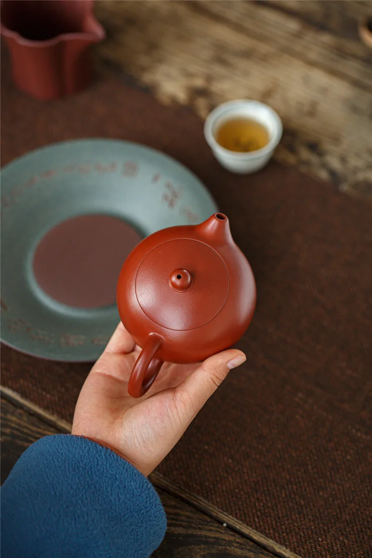 Description Picture 5 of item240ML Yixing Purple Clay Teapot Machine-made Xishi Tea Pot Raw Ore Dahongpao Quality Teaware Oolong Pu're Tea Set Filter Kettle