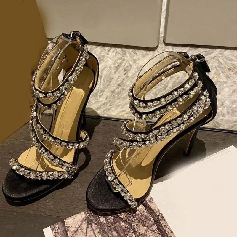 Sandalias con punta abierta y correa cruzada para mujer, zapatos con diamantes de imitación, cinturón de una palabra, tacón de aguja ostentoso, cubierta de tacón con cremallera, moda