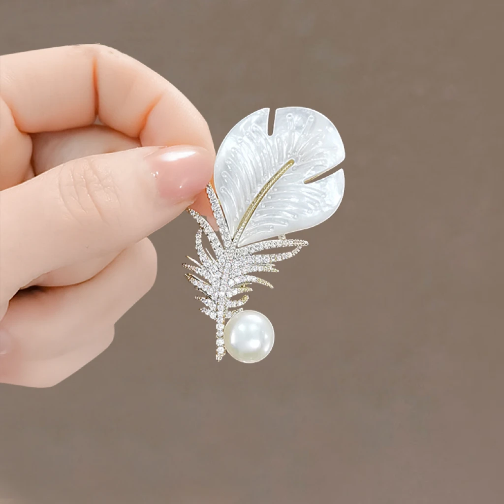 280034-67084a.jpg S64b264d8b63148478e442fda29ddbd7fo Fashion Crystal Shell Feather Brooch Pins For Women Luxury White Pearl Gold Color Party Wedding Gifts Clothing Accessories Mallzona