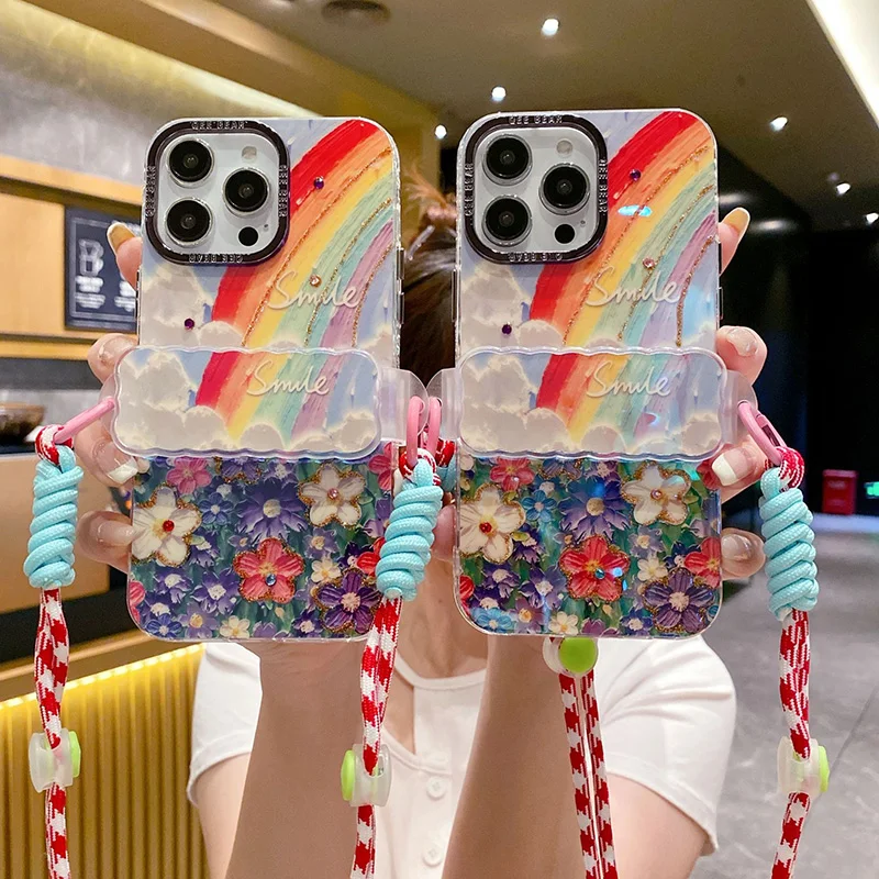 

IPhone 15/13/14 promax Rainbow Colorful Flower Diagonal Straddle Bracelet Anti drop Women's New Phone Case
