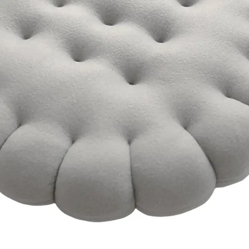 Detailshot van het biscuit patroon op het kussen