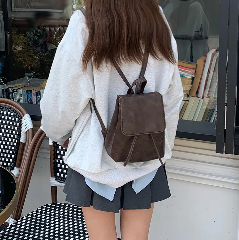 

2024 New Small Drawstring Vintage Women Mini PU Leather Textured School Backpack Fashion Travel Commuter Bag Girl Bakpacks