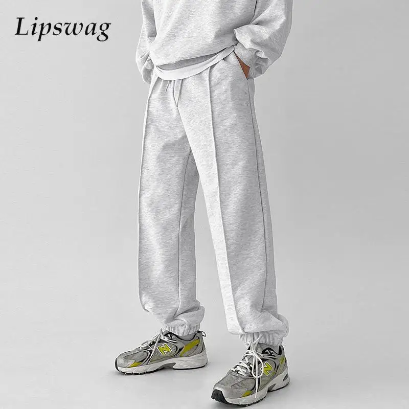 

Streetwear Mens Sweatpants Autumn Casual Loose Lace-up Drawstring Sports Pants Men Fashion Pleated Design Jogging Trousers Male