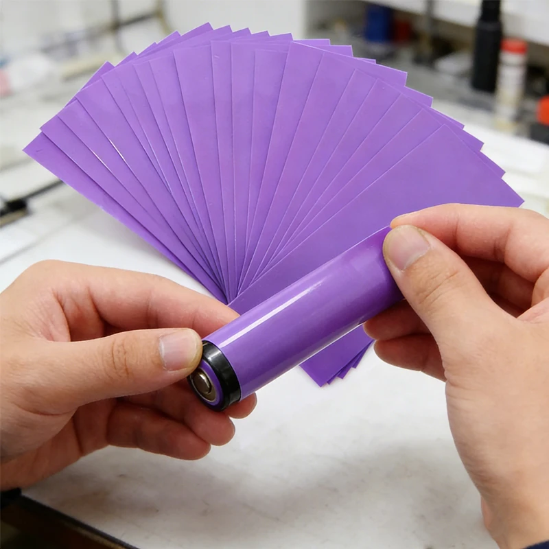 100pcs Gaine Thermorétractable PVC pour Batterie 18650 - Bleu/Vert/Violet