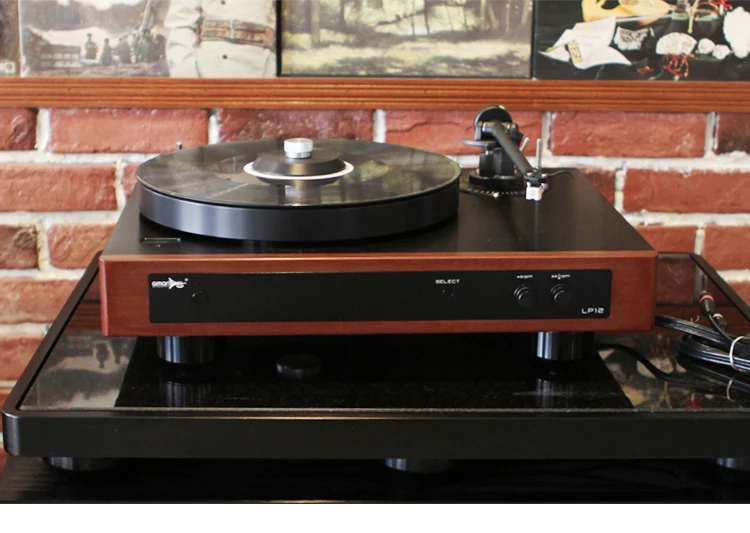 

New LP-12s vinyl record player, with tonearm cartridge, phono disc suppression governor.