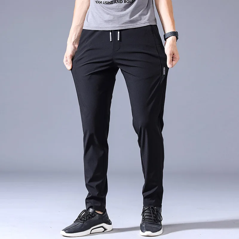 2024 Summer Ice Silk Thin Sports Pants Men's Straight Loose Elastic Non ironing Casual Pants Men's Work Wear Pants