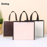 StoBag 50pcs Wholesale Non-woven Tote Bags Shopping Portable Fabric Gift Clothes Packaging Reusable Pouch Custom Logo(Extra Fee) 1