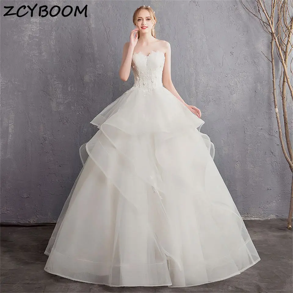 

Elegant Strapless Tulle Appliques Tiered Wedding Dresses For Women 2024 Sweep Train Ball Gown Bridal Gown Vestidos De Novia