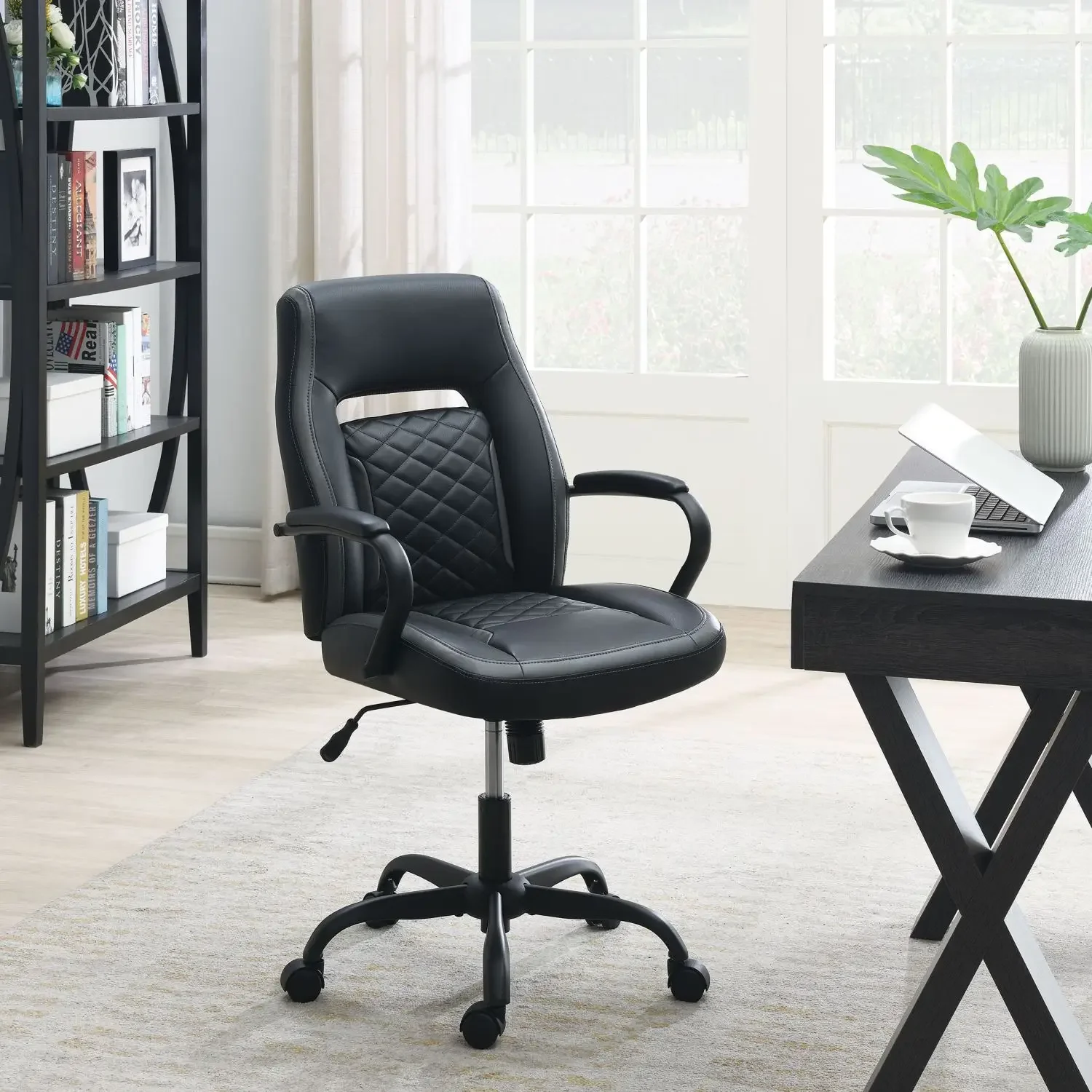 

Elegant Black Faux Leather OFFICE CHAIR with Comfortable Padding and Sturdy Base, Perfect for Home or Workplace Use