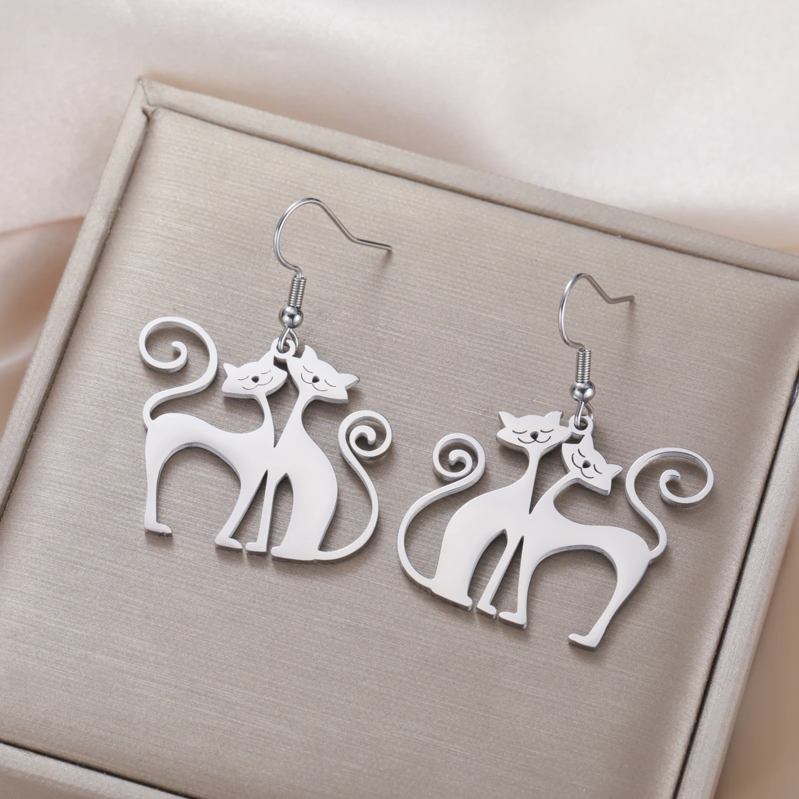 2291-34629c.jpg dangling cat earrings