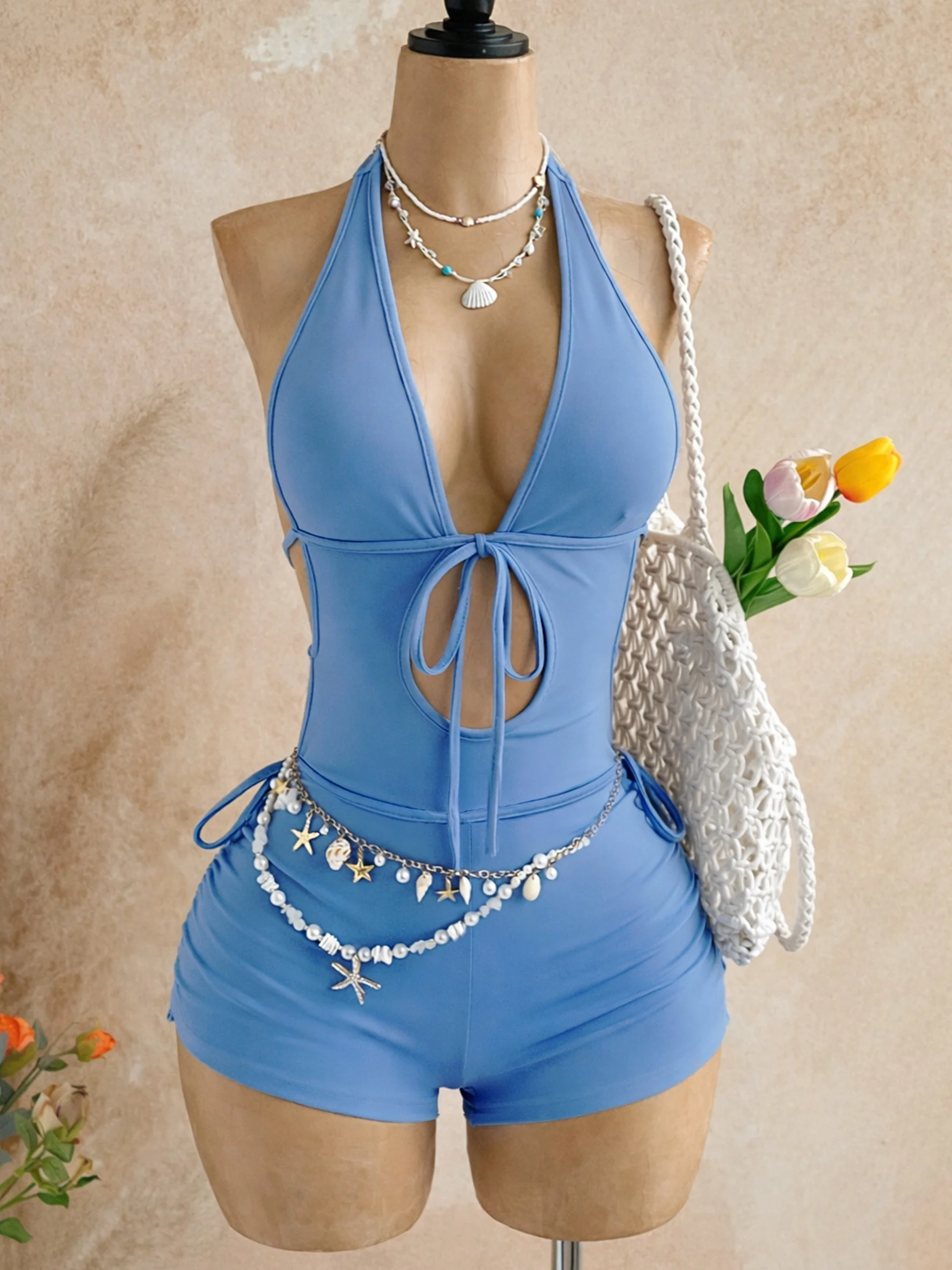 halter romper with side tie detail