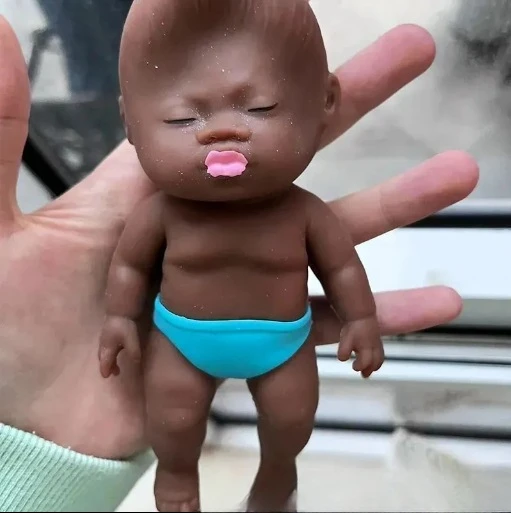 Muñeca negra de descompresión, divertida muñeca pequeña de Palma