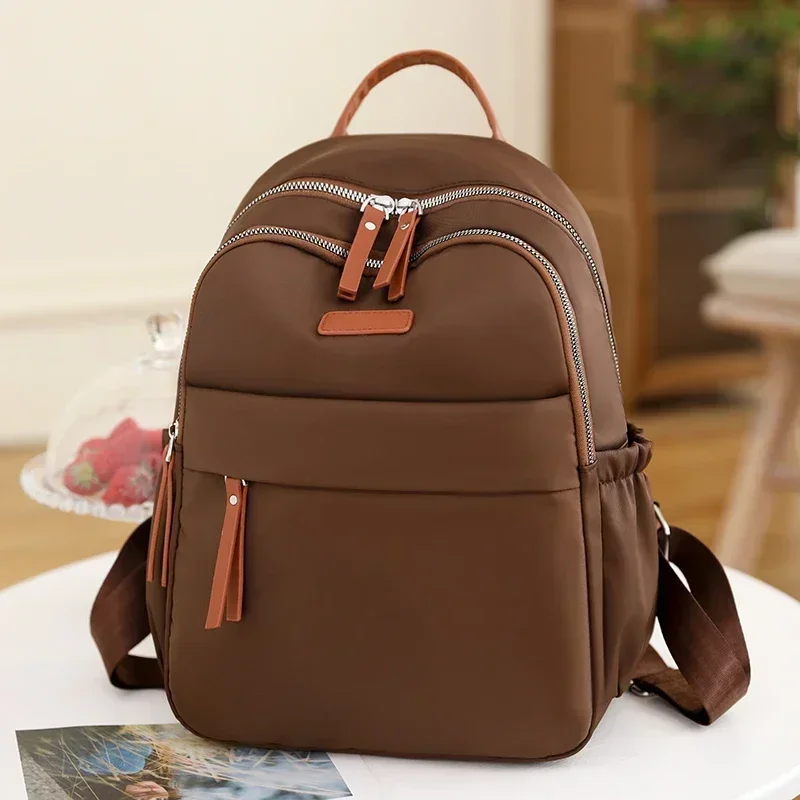 

Women's Backpack New Fashion Trend Solid Oxford Spin Zipper Leisure Large Capacity 여성용 백팩 Women's Backpack